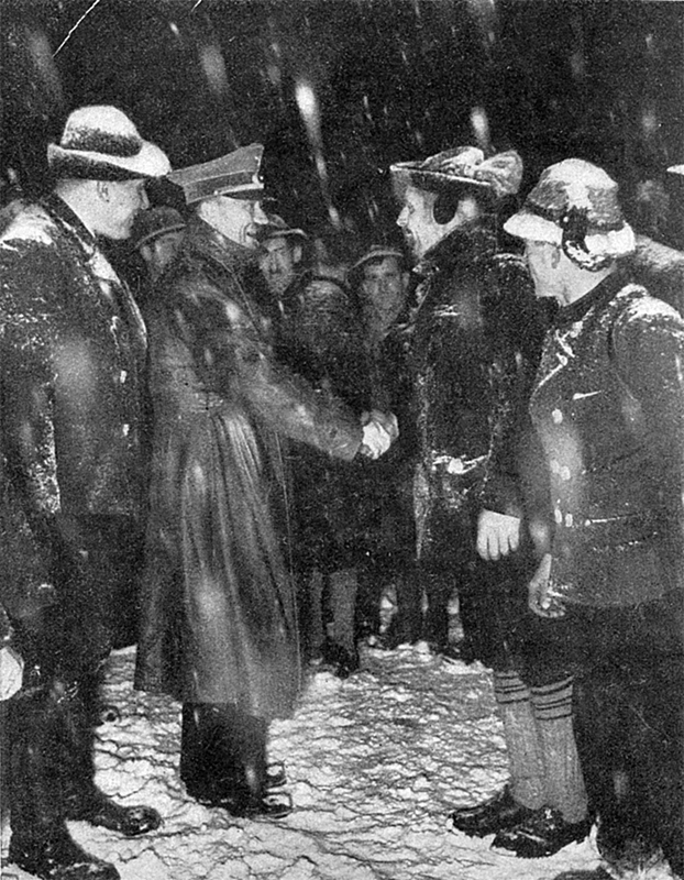 Adolf Hitler greets the Berchtesgadener Weihnachtsschützen on New Year's Eve